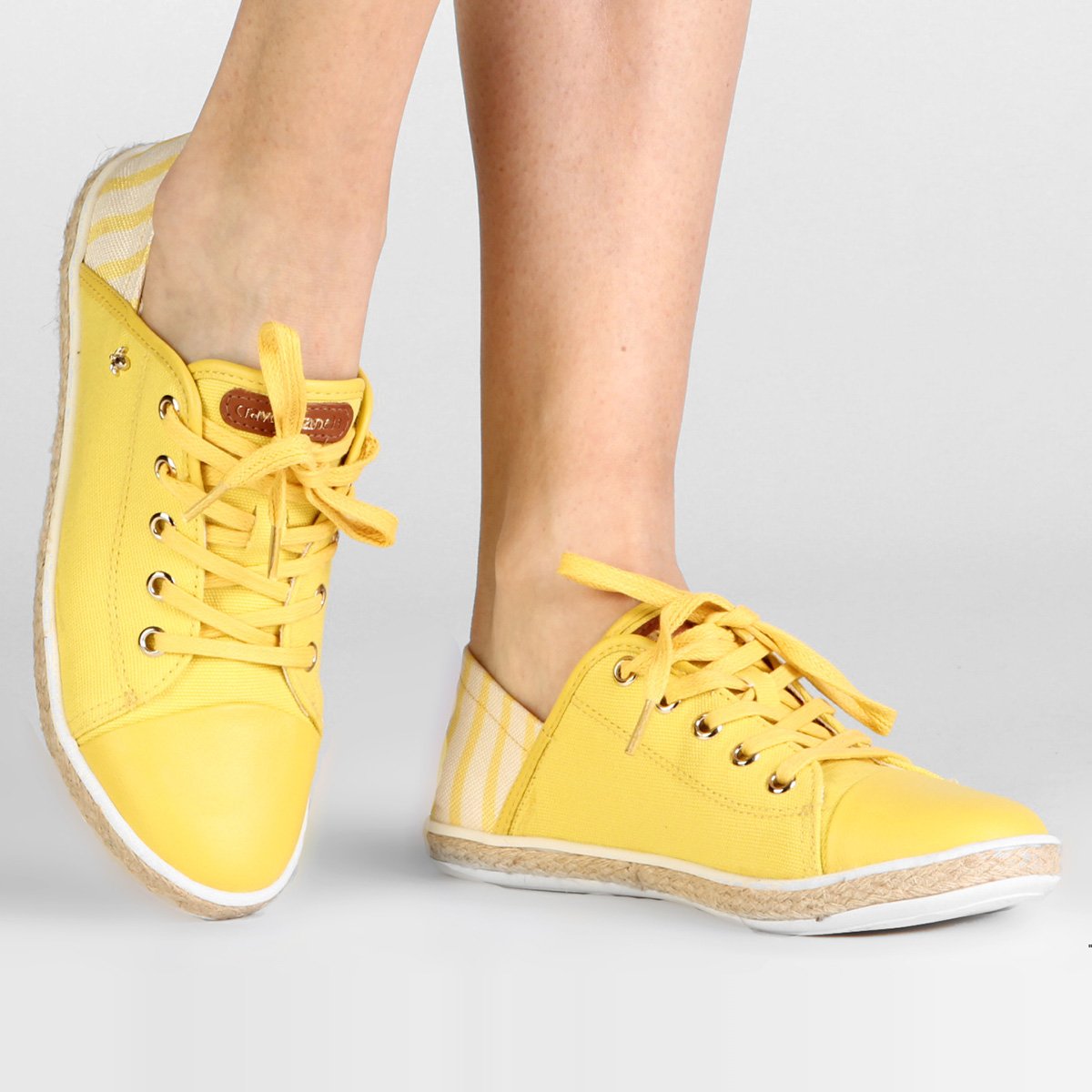 tenis cravo e canela amarelo